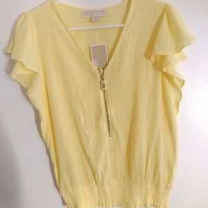 Michael Kors xs yellow top will look better on you than it did on me. 💛